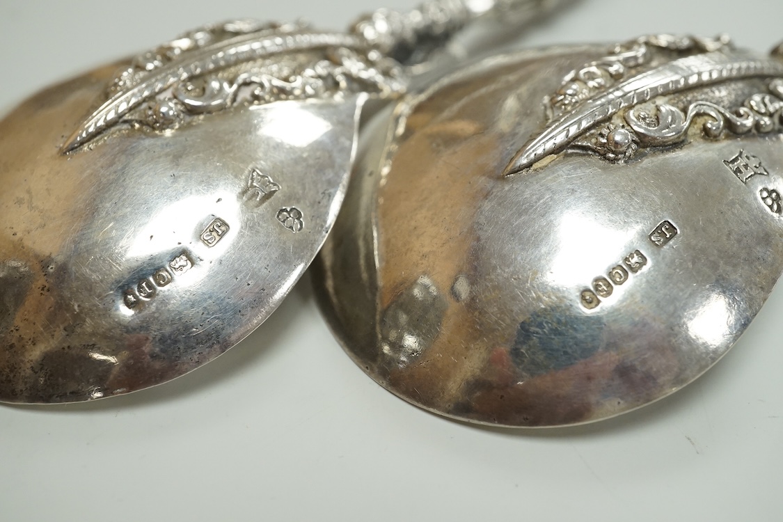 A pair of late 19th century Hanau silver spoons, with warrior finials, import marks for John George Smith, London, 1898, 18.6cm, 5oz.